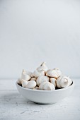 Meringues in a white bowl