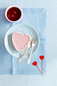 Cherry panna cotta with cherry sauce and grated coconut