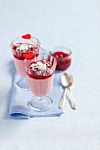Cherry panna cotta with cherry sauce and grated coconut