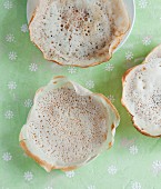 Hoppers or Appam (coconut and rice pancakes, India)