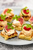 Canapés with figs, and canapés with hummus