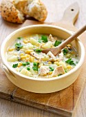 Spicy chicken soup with peas and sweetcorn