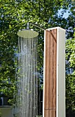 Outdoor shower with running water
