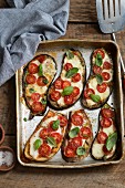 Oven-roasted aubergines with mozzarella, tomatoes and basil