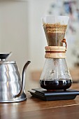 Filter coffee being made with a Chemex coffee carafe