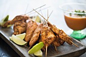 Chicken skewers with a tomato and chilli dip