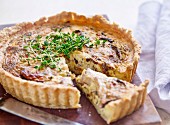 Quiche with cabbage and thyme, sliced