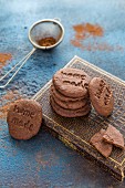 Homemade chocolate biscuits dusted with cocoa powder