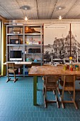 Dining table and work area in industrial loft apartment