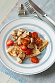Pancakes with cherry tomatoes and mushrooms