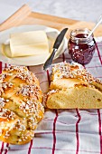 Brioche with sugar nibs, butter and jam