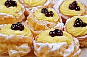 Zeppole di San Giuseppe (choux pastries filled with cream and amarena, Italy)