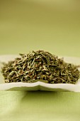 A pile of green tea leaves