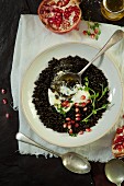 Lentils with yoghurt and pomegranate seeds