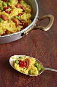 Saffron rice with peas, dried tomatoes and cashew nuts