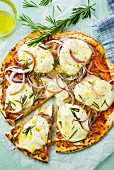 Onion pizza with mozzarella and rosemary, sliced