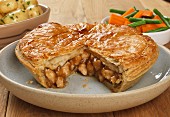 Chicken pie with potatoes and vegetables