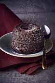 Chocolate cakes with icing sugar