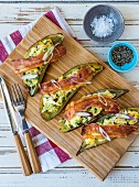 Stuffed sweet potatoes with bacon and onions