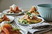 Potato cakes with salmon, cucumber and sour cream