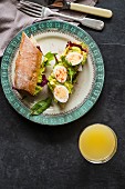 A quail egg and avocado sandwich