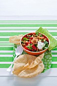 Chickpea salad with peppers and poppadoms