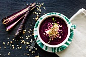 Cream of purple carrot soup with walnuts