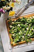 Puff pastry tart with green vegetables for Easter