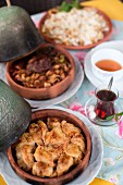 A selection of Turkish dishes and tea on a table