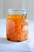 Preserved pumpkin in a flip-top jar