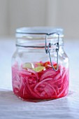 Pickled onions with garlic and chilli peppers