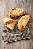 Apple turnovers on a wire rack