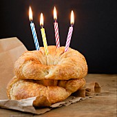 Croissants with birthday candles