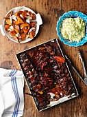 Pork ribs with chilli, fried sweet potatoes and guacamole