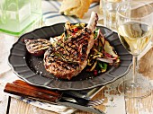 Grilled pork chops with vegetables and white wine