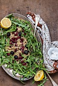 Lemon and wholemeal rice with beans, olives and rocket