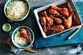 Chicken legs in a honey and soya sauce with coconut rice