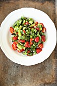 Asparagus salad with strawberries, coriander and pumpkin seeds