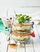 Apricot and mint cake in glasses as a gift