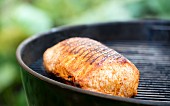 Grilled pork loin on a barbecue