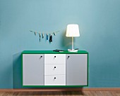 Floating sideboard with green frame