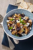 Aubergine and feta cheese salad with pine nuts