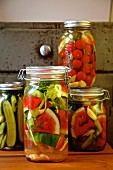 Jars of pickled vegetables (watermelon, cucumber, celery, tomatoes, garlic, dill) from Russia