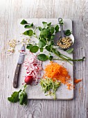 Ingredients for watercress and raw vegetable salad with tender wheat