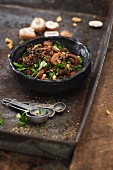 Mushroom salad with black rice and a walnut dressing