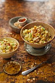 Rice salad with chicken, flaked almonds and a curry and orange dressing