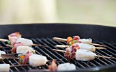 Scallop skewers on a barbecue