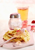 Sweet pancakes with rose jelly