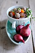 Red onion soup with meatballs