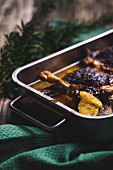 Duck legs with oranges, cranberries and honey